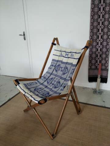 Quartier rouge - L'exposé des motifs - Depuis l’architecture des lieux, les artistes imaginent et tissent un motif inspiré de la charpente métallique du gymnase, élément emblématique du LMB.  